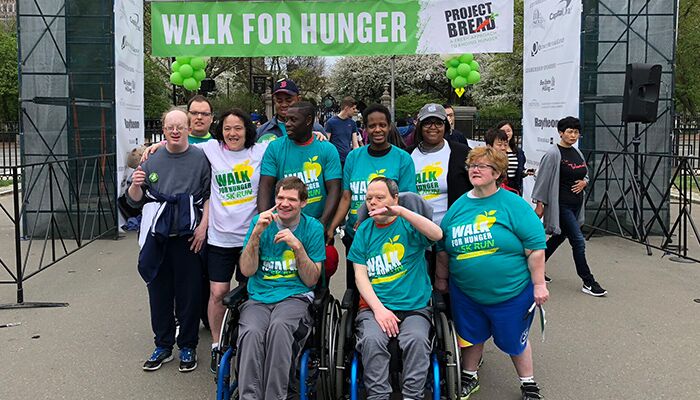 Volunteers who participated in Walk for Hunger celebrating after the event