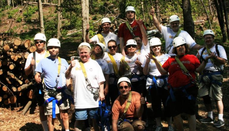 Group of adults ziplining